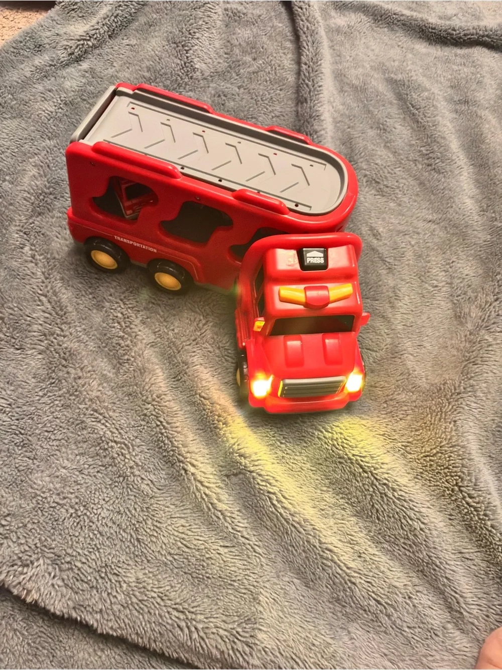 Red Fire Truck Carrier Playset with Yellow Wheels